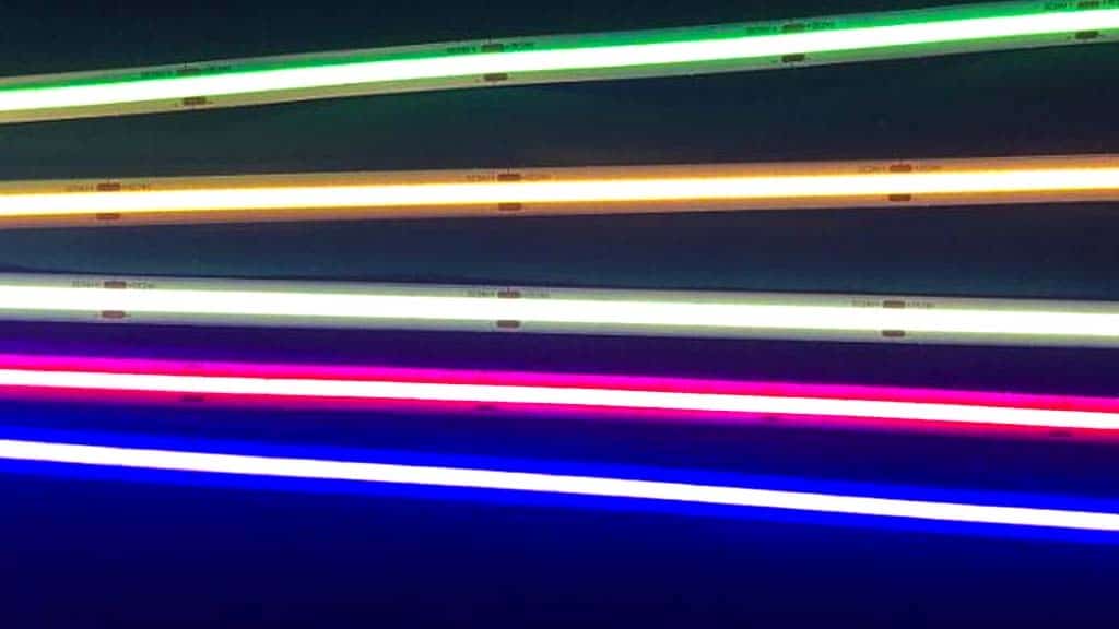 5 Bright Dotless Neon Strip Lights lined up horizontally with a black background.